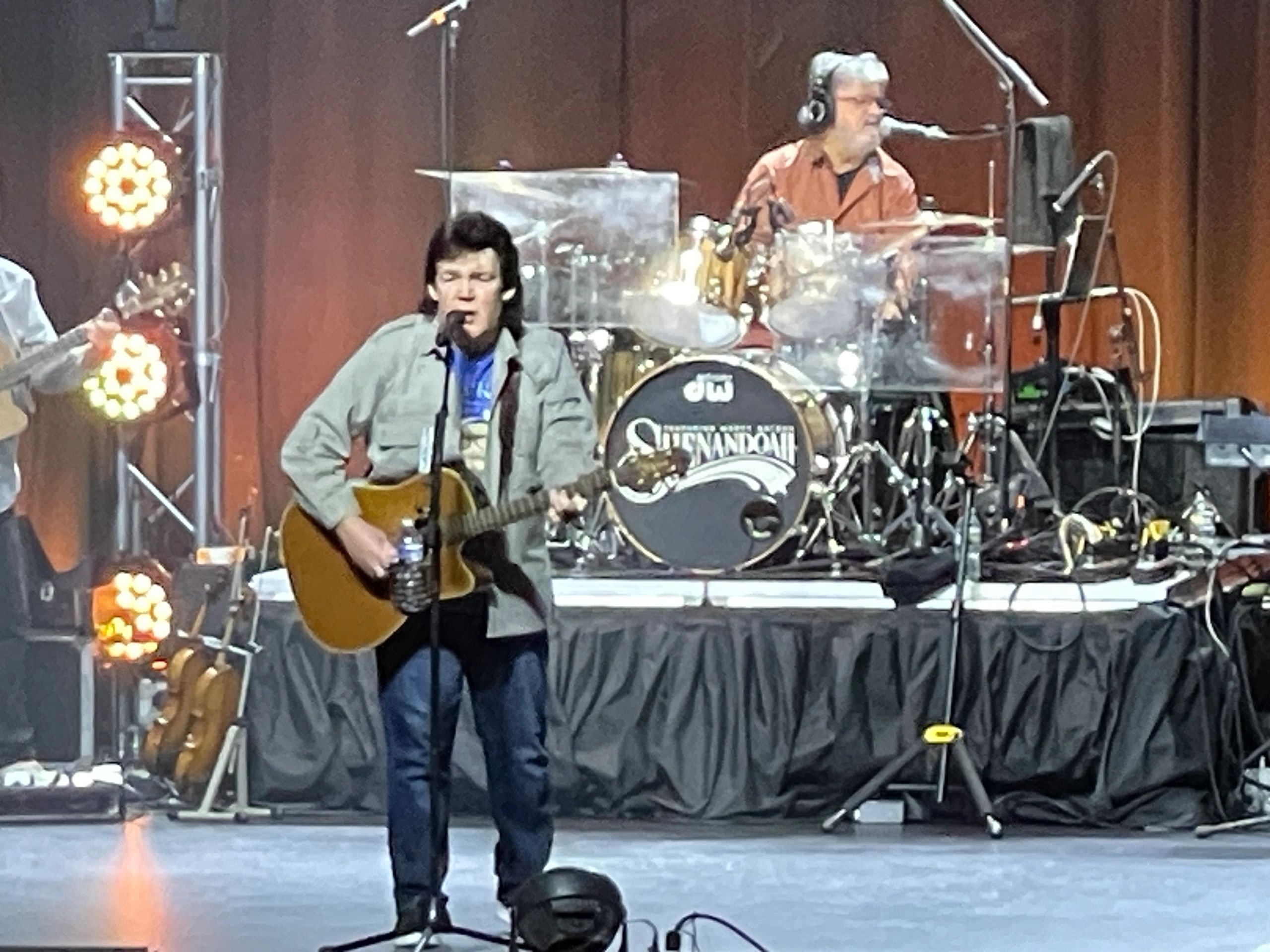 Guitarist and drummer performing