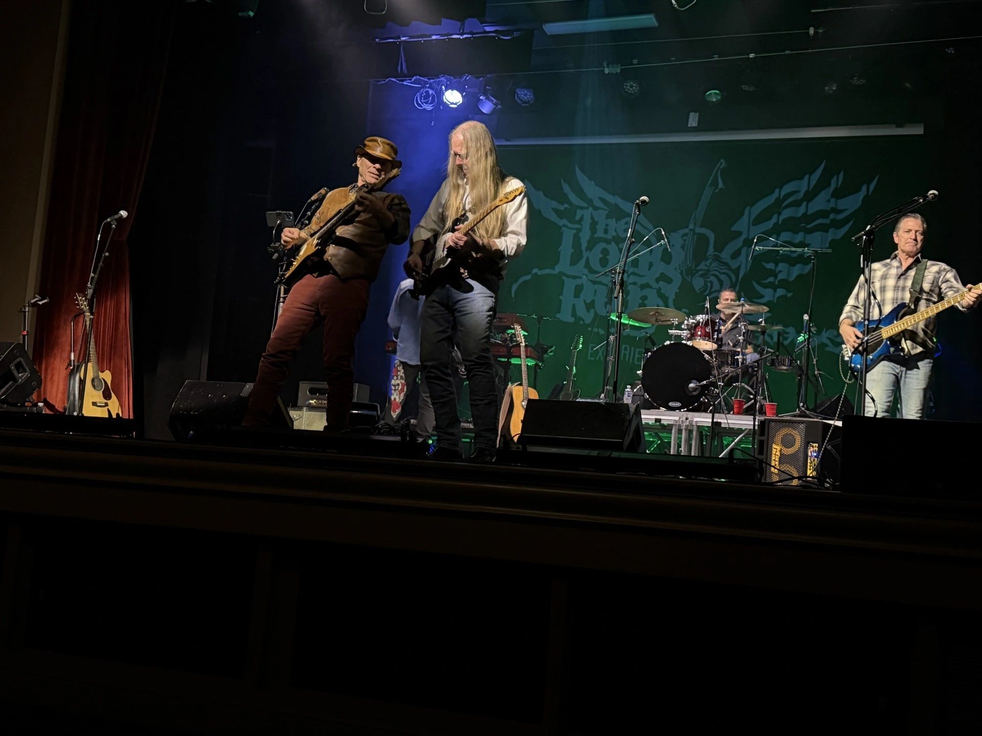 Five piece band on stage
