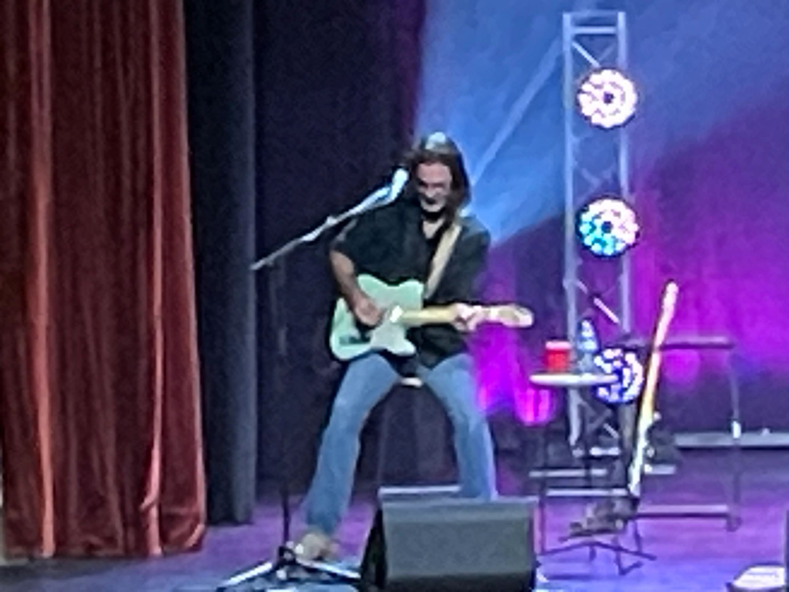 Guitarist performing on stage